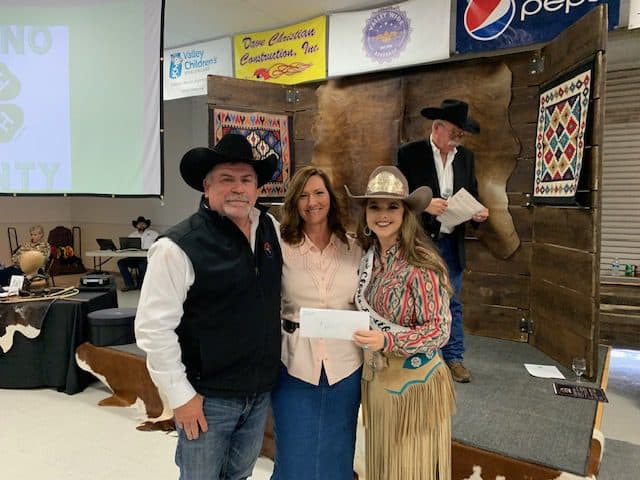 Ron Dunbar Corissa King and prize bidder Cowgirl Up 2022 Karen - cowgirl up Ron Dunbar and Vince Genco in the arena at the Clovis Rodeo